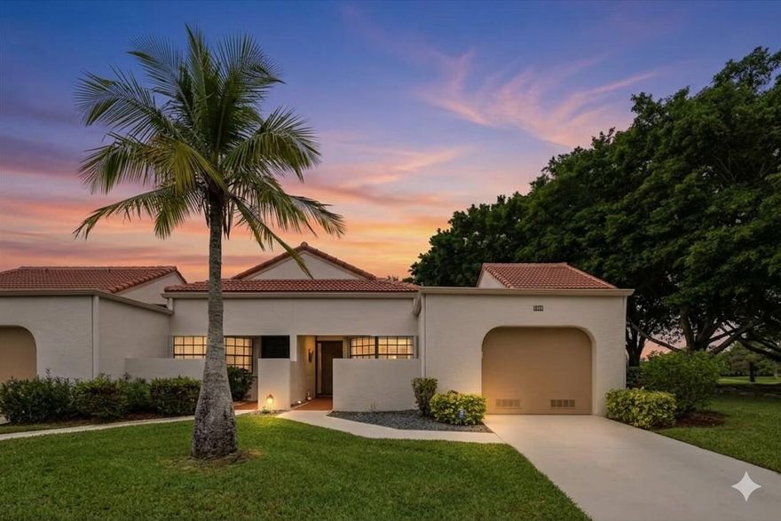 Beautifully-maintained 2/2 in the heart of Boynton Beach!  Close to world-class beaches, shopping, restaurants, and everything South Florida has to offer.  Parkwalk/Aberdeen/The Shores is ideally situated.  This courtyard home features expanded outdoor living overlooking a tranquil lake, and it's walking distance to the community clubhouse/fitness center/pool/and courts. The layout is spacious and boasts lovely neutral tile floors, carpets, paint, and cabinetry.  Thoughtfully updated with an oversized glass lanai with impact sliders, a kitchen water filtration system for drinking and cooking, new water heater in 2023, and the owner has even paid the roof replacement assessment in full!  You'll be proud to own this lovely home - fantastic for everyday living and for entertaining.
