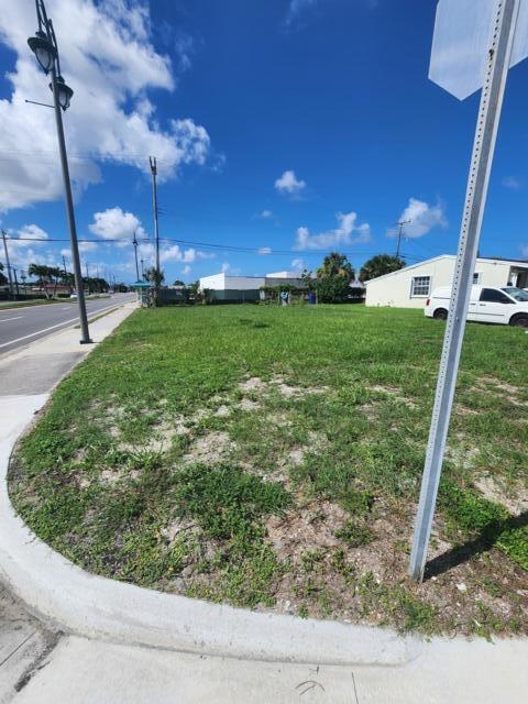 A desirable corner lot just minutes from downtown West Palm Beach. This build-ready parcel is nestled in a well-established neighborhood with convenient access to the city's vibrant core, offering the perfect blend of quiet living and urban convenience. With high visibility and easy access, this versatile parcel is the perfect place to build your custom home. The lot offers flexibility and convenience for your future home design, whether you're ready to build now or investing for the future, this lot offers incredible potential.
