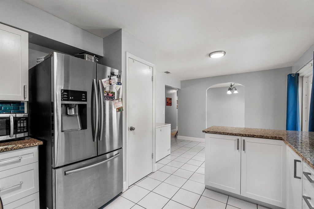 Photo of 1179 Fernlea Drive, West Palm Beach, FL 33417 (MLS # R11126190)