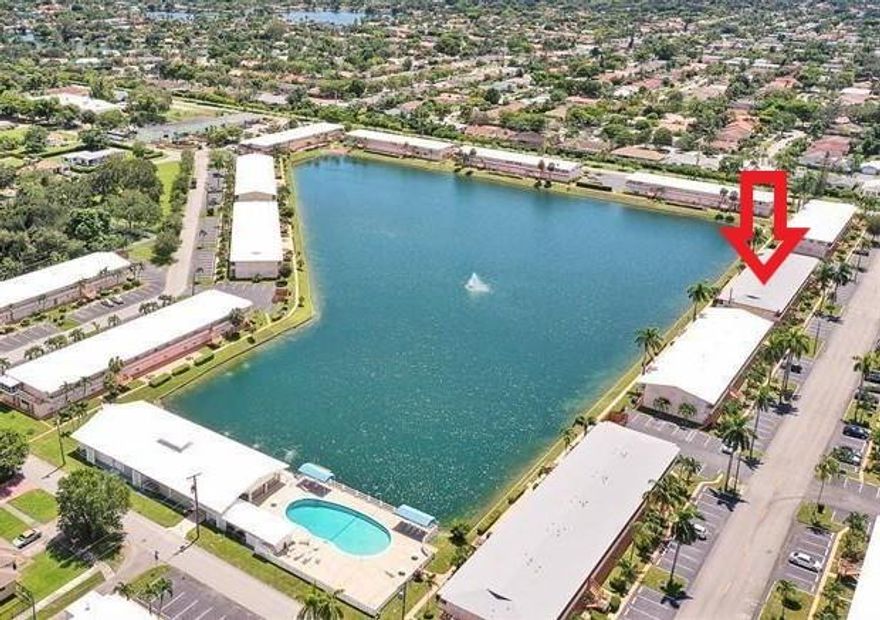 BRING YOUR FUSSIEST BUYERS! Spotless unit with direct "LAKE VIEW" remodeled in 2018  "WITH PERMITS"  is sold FURNISHED, TURNKEY! Enjoy your morning coffe on your private terrace with this relaxing view of the lake & fountain. New "OPEN KITCHEN" with new wood cabinets, countertop, decorative wave tile backsplash & appliances. Large pantry with EXTRA FREEZER & WINE COOLER INCLUDED. Hook-up for "WASHER" intalled in unit. New Ceramic tile floors set diagonally. CENTRAL A/C. Accordions Shutters installed on every openings. Remodeled bath with new vanity, toilet, bath/shower & custom shower glass door.  New plumbing & lighting fixtures thru-out. Large bedroom with accent wall & huge closet. Community with clubhouse, gym, pool, bocce, BBQ & more. Cash only, 55+, rent after one year. 40 yrs done.