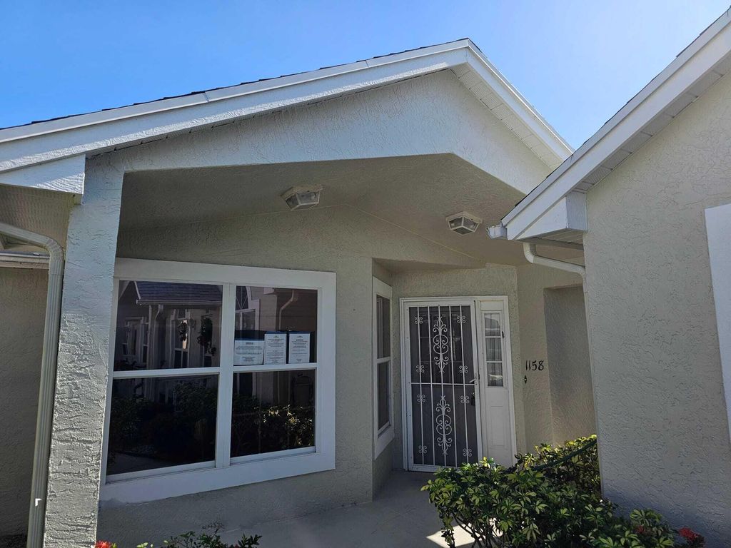 Photo of 1158 NW Lombardy Drive, Port Saint Lucie, FL 34986 (MLS # R10944223)