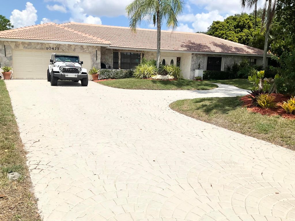 Photo of 10477 NW 4th Street, Coral Springs, FL 33071 (MLS # B26009521)
