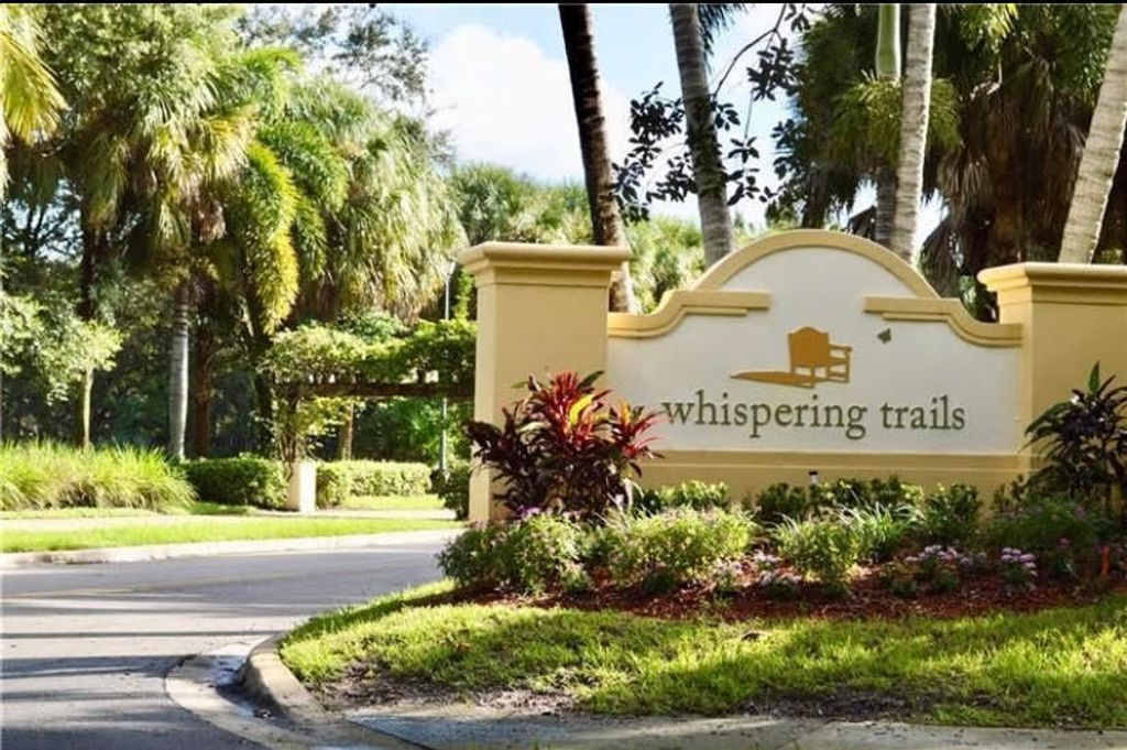 Photo of 3907 Passion Flower Road, Coconut Creek, FL 33073 (MLS # R10948261)