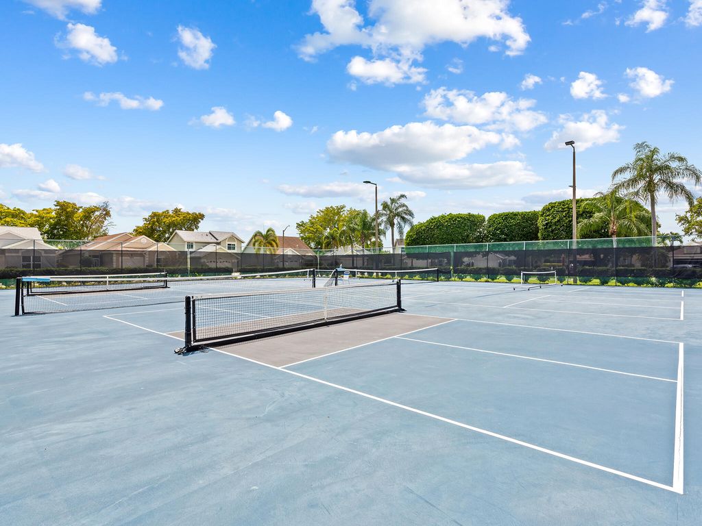 Photo of 13750 Oneida Drive #E1, Delray Beach, FL 33446 (MLS # B26019675)