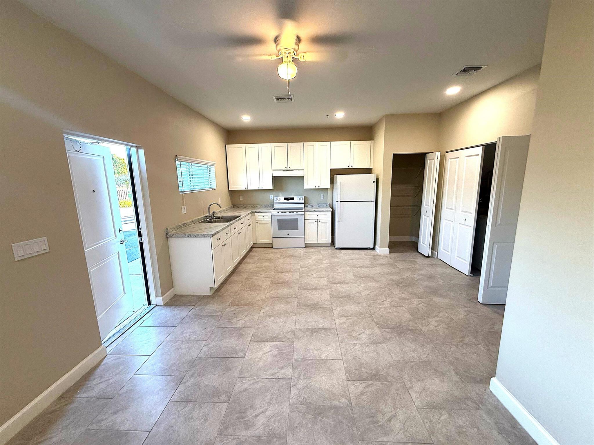 Welcome to your beautiful, newly built townhome! Built in 2025, these two-story units redefine modern convenience. Their prime location puts you steps from Palm Beach State College, JFK Hospital, and major public transportation routes via I-95. Enjoy a spacious and bright layout. Each unit includes a new kitchen appliance package and washer/dryer. Impact-resistant windows. NO HOA!Move-in Offer: For a limited time only! First month FREE!Fast approval!