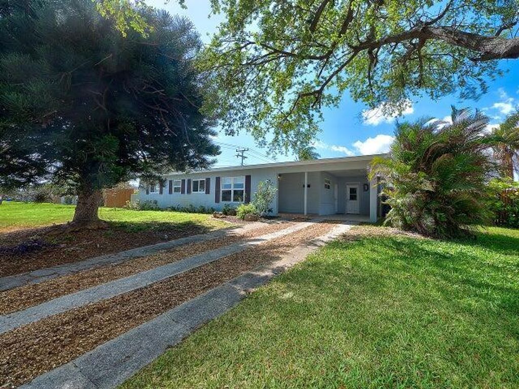 Photo of 650 Palmetto Drive, Lake Park, FL 33403 (MLS # R10878594)