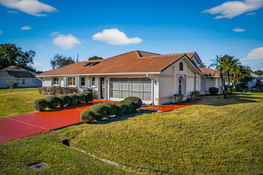 Come see this gorgeous and spacious pool home located in a sweeping corner lot with an oversized patio and a screened in pool. This CBS home has been beautifully remodeled with an open layout and a modern quartz countertops kitchen with brand new stainless steel appliances. This place comes with brand new waterproof vinyl planks flooring with modern baseboards throughout the house, completely updated bathrooms with beautiful tile, new tempered glass doors, new vanities with quartz countertops, among other elegant touches. It's been freshly painted inside and outside; including epoxy paint in the double car garage flooring, driveway and pool deck. Enjoy a brand new garage door; just replaced. The pool is amazing!!! and it has a brand new screen throughout the whole pool enclosure, beautiful brand new lighting/water fixtures and the list goes on...! This place also has accordion shutters in all the windows and exterior doors for a peace of mind. Come see this home today, as it won't last too long! *Buyer's agent needs to corroborate all the information in this listing*