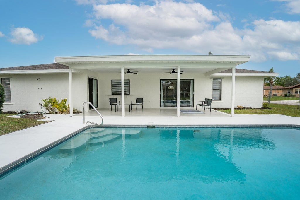 Photo of 502 SW Twig Avenue, Port Saint Lucie, FL 34983 (MLS # R10958731)