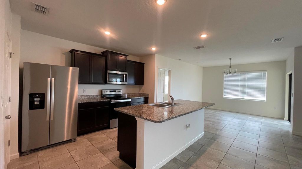 Photo of 6444 NW Castlebrooke Avenue, Port Saint Lucie, FL 34983 (MLS # R11035109)
