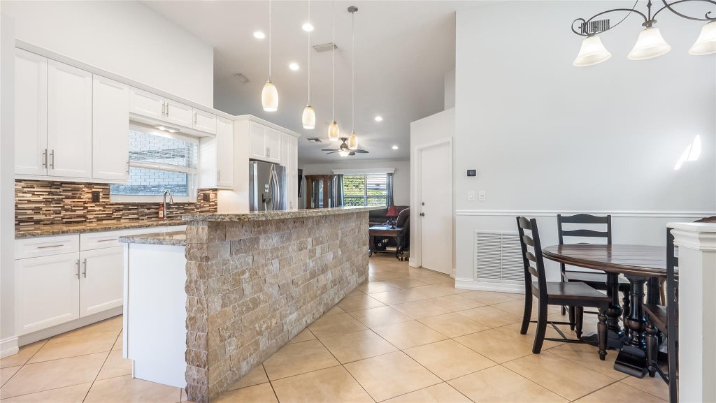 Photo of 4854 NW 104th Lane, Coral Springs, FL 33076 (MLS # F10521094)