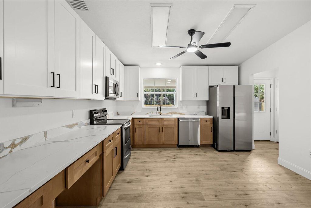 Photo of 3817 SW Cheribon Street, Port Saint Lucie, FL 34953 (MLS # R11123852)