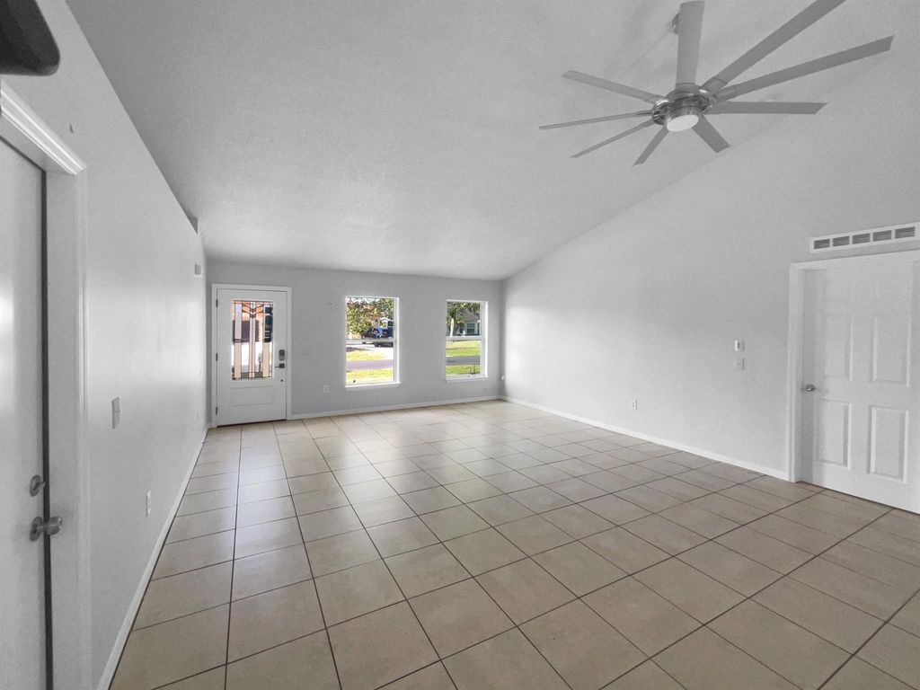 Photo of 1281 SW Crost Avenue, Port Saint Lucie, FL 34953 (MLS # R11084926)