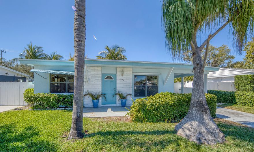 Feel those balmy ocean breezes? Adorable 2/1, CBS construction home is just minutes to Lantana beach and intracoastal, and has loads of storage, carport and plenty of room to build out whatever you've been dreaming of!   The huge fully fenced backyard with mature mango and fruit trees, can fit a pool, ADU and has plenty of space for kids and fur babies to run and play.  Fully enclosed porch offers 180 more square feet of air conditioned comfort. Perfect as a family room or extra BR.   Original features include Terrazzo floors, dade county pine, pecky cypress and handcrafted cedar.  Your extra touches can turn this into a real showstopper!