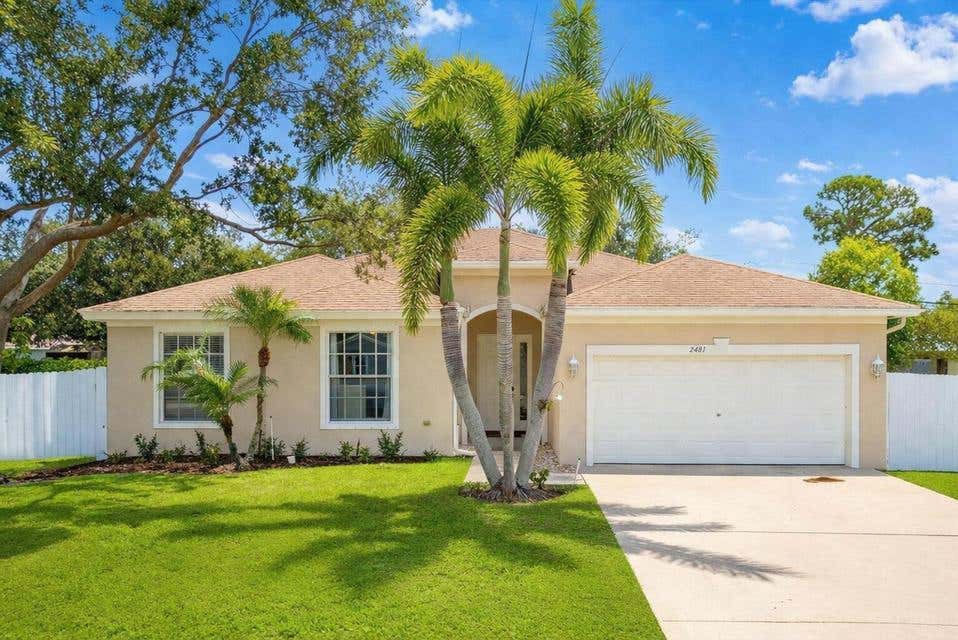 Photo of 2481 SE BERKSHIRE Boulevard, Port Saint Lucie, FL 34952 (MLS # B26060867)