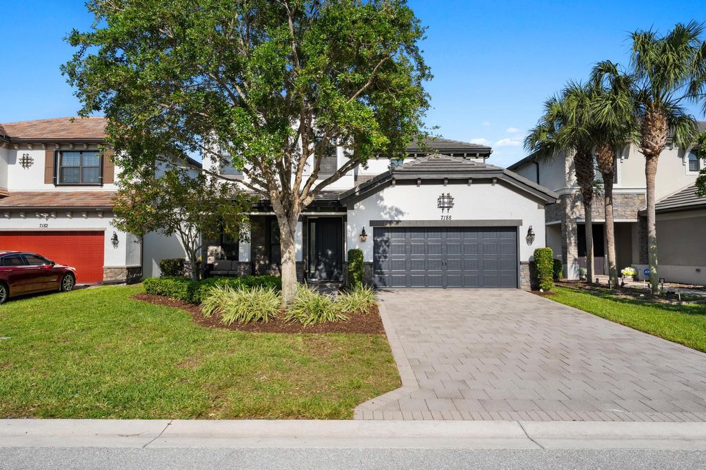 Photo of 7188 Sandgrace Lane, Lake Worth, FL 33463 (MLS # B26022762)