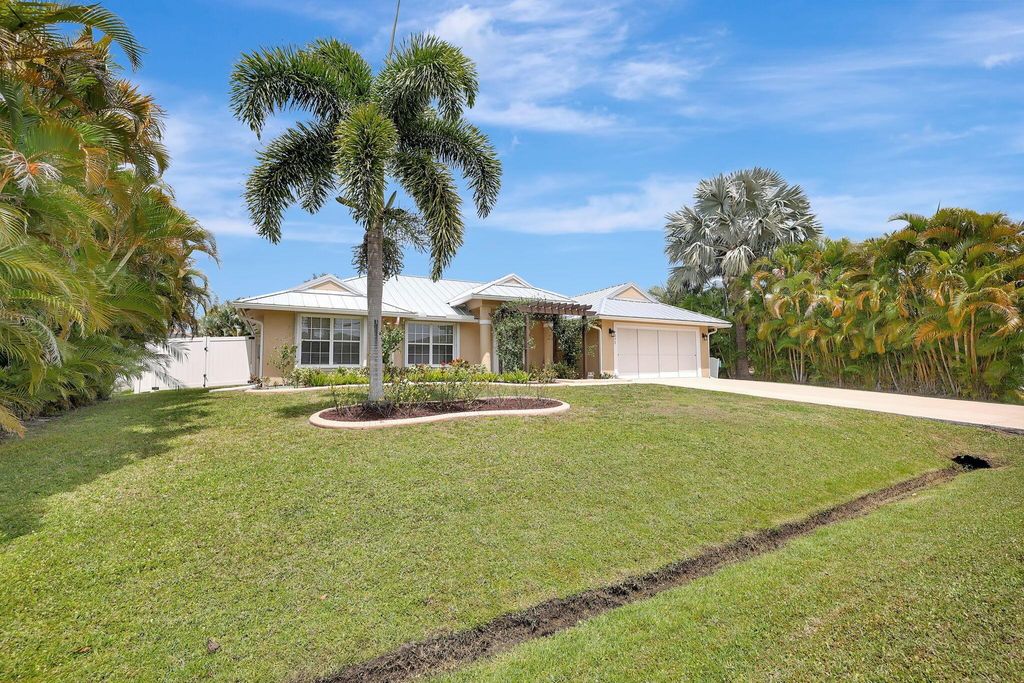 Photo of 1273 SW Mancuso Avenue, Port Saint Lucie, FL 34953 (MLS # R10974953)