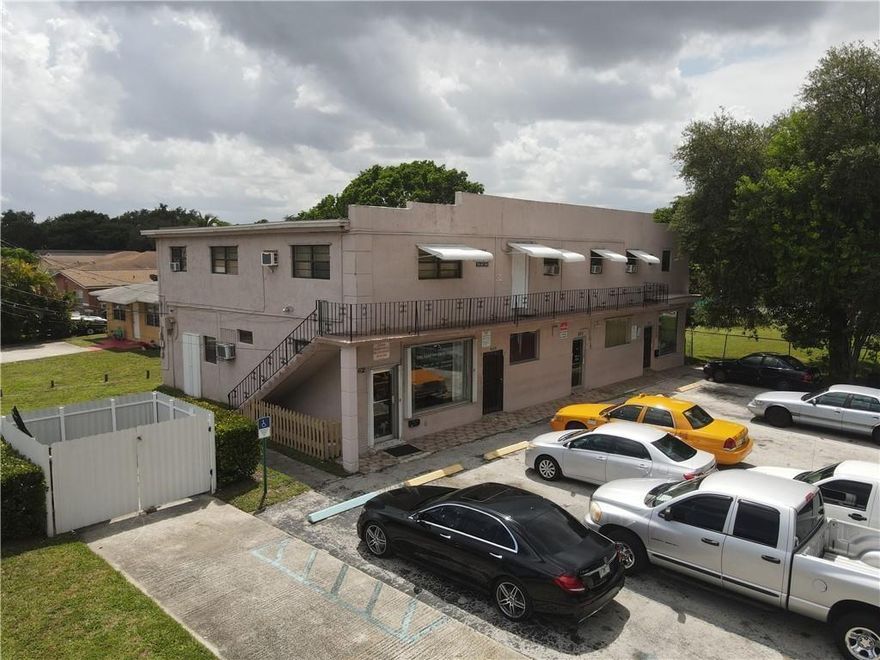 4 metered retail units on the 1st floor and 9 residential units on the 2nd floor with multiple bathrooms. Property is a hands on managed proud possession with a management office on site. Sale includes adjacent vacant lot to the west. Total lot size is 18,988 Sq. Ft. Two folio numbers 5042 34 01 2430 and 5042 34 01 2431. RENTS: R1-$1,400.00 R2-$750.00 R3-$750.00 R4- $750.00 R5- $750.00 R6-$750.00 R7-$750.00 R8-$750.00 R9-$750.00. Com 604-$900.00 Com 606-$900.00 Com 608-$900.00 Com-602 Owner Occupied.