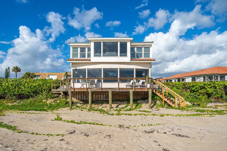 One of a kind ultimate beach house directly on the sand! Rarely available, SEAWATCH enjoys the south Florida splendors - morning sunrises, salty air, and panoramic views of the ocean.  SEAWATCH is a sophisticated coastal gem but with a relaxed feel.  This unique, exceptionally private home offers two bedrooms plus an office or room for a third bedroom to be enjoyed by family and friends. Situated on a pristine location where land meets the sea this healthy haven provides privacy and multiple outdoor spaces to enjoy your fitness and wellness routines - yoga, swimming, paddle boarding, surfing or al fresco dining on the open air patio. Host beach volleyball or simply enjoy a cheeseburger in paradise! Conveniently located to Palm Beach, dining and shopping.