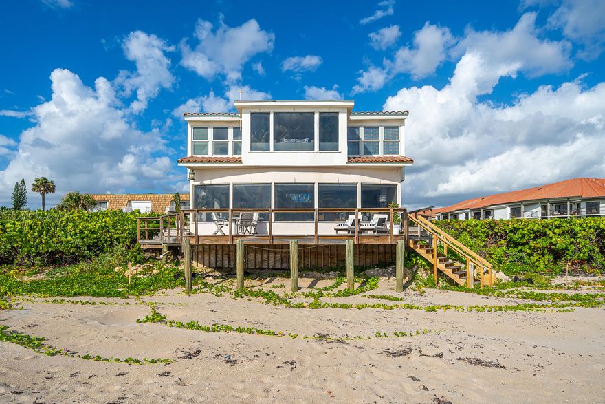 One of a kind ultimate beach house directly on the sand! Rarely available, SEAWATCH enjoys the south Florida splendors - morning sunrises, salty air, and panoramic views of the ocean.  SEAWATCH is a sophisticated coastal gem but with a relaxed feel.  This unique, exceptionally private home offers two bedrooms plus an office or room for a third bedroom to be enjoyed by family and friends. Situated on a pristine location where land meets the sea this healthy haven provides privacy and multiple outdoor spaces to enjoy your fitness and wellness routines - yoga, swimming, paddle boarding, surfing or al fresco dining on the open air patio. Host beach volleyball or simply enjoy a cheeseburger in paradise! Conveniently located to Palm Beach, dining and shopping.
