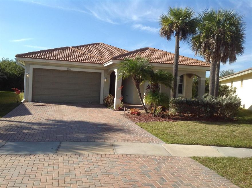 GREAT SINGLE FAMILY HOME IN UP & COMING NEIGHBORHOOD- 3 BEDROOMS 2  BATH -2 CAR GARGE-LOW MONTHLY H.O.A.
STAINLESS STEEL APPLIANCES-PAVERS ON DRIVEWAY & PATIO-TILED LIVING AREA-CARPET IN BEDROOMS-
BEAUTIFUL CLUBHOUSE-WITH STATE OF THE ART GYM-POOL-BASKET BALL, TENNIS COURTS & TOT LOT
SELLER GIVING $5000.00 CREDIT AT CLOSING FOR PAINT & CARPET