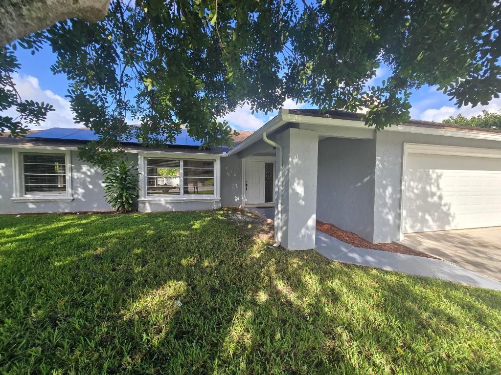 Photo of 242 Las Palmas Street, Royal Palm Beach, FL 33411 (MLS # R11134205)