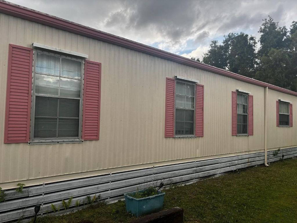 Photo of 14 SE Novedades, Port Saint Lucie, FL 34952 (MLS # R11065324)