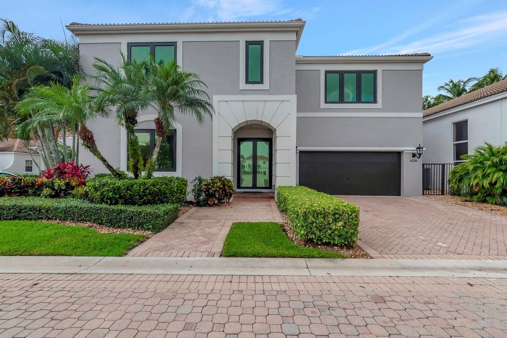 Photo of 4238 NW 65th Place, Boca Raton, FL 33496 (MLS # R10892985)