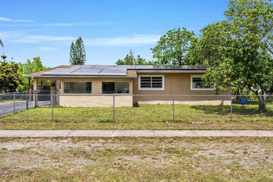 Discover this beautifully maintained 4-bedroom, 2-bathroom residence nestled in the sought-after Park Plaza neighborhood of Fort Lauderdale. Enjoy the benefits of solar panels, offering substantial savings on your energy bills. Major updates include a new roof (2017), AC system (2019), and water heater (2016), giving you peace of mind for years to come. Step outside to a generous fenced backyard complete with fruit trees — your own private retreat. Families will love the walkability to Westwood Heights Elementary, while easy access to restaurants, shops, and major highways makes everyday living a breeze. A rare find in an unbeatable location!