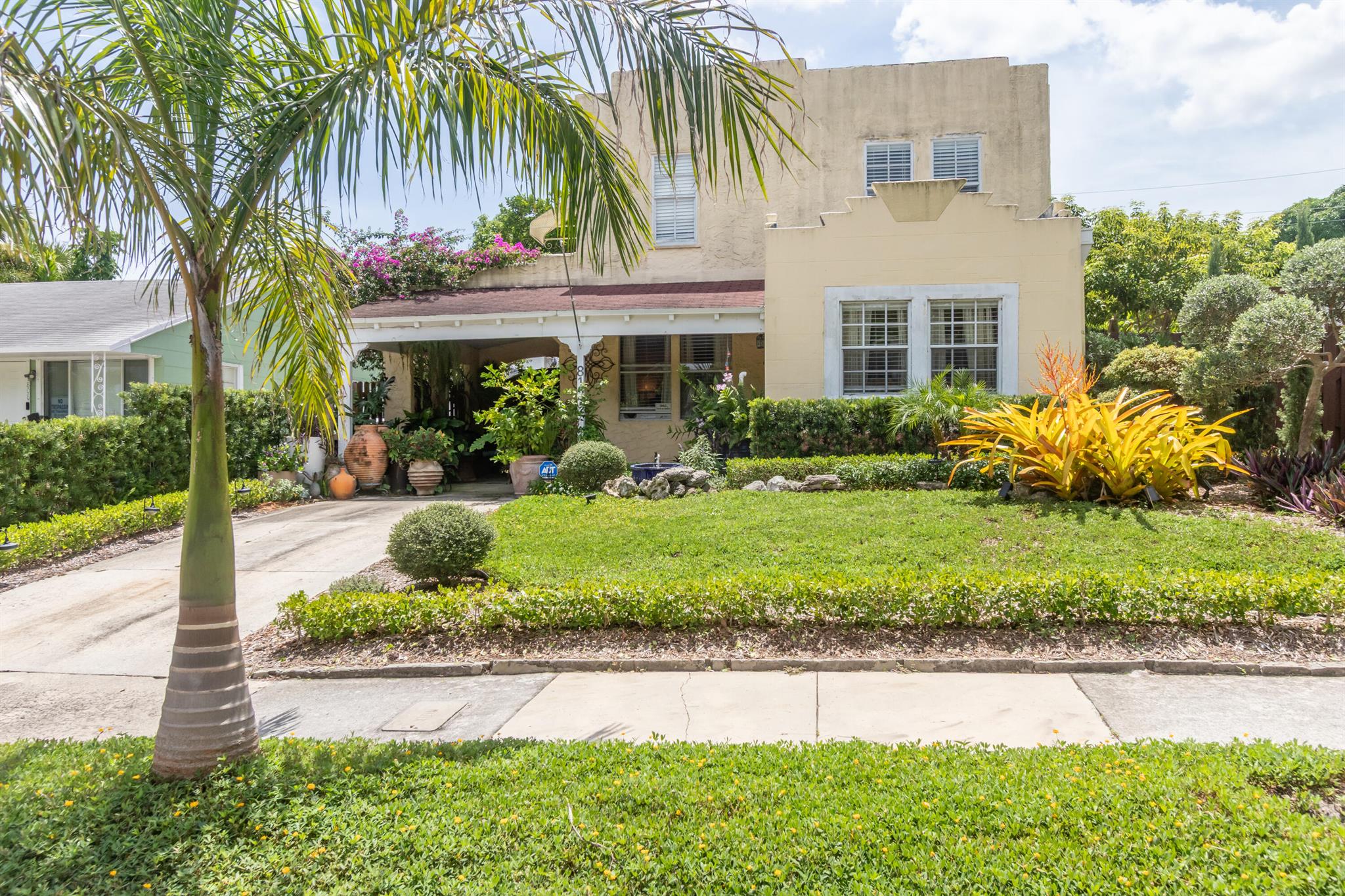 Unique opportunity to transform this 3 bedroom/1 bath, two-story Spanish style charmer into your dream home in Historic Northwood Hills, minutes from downtown West Palm Beach. Large kitchen is designer ready & includes brand new appliances. Recently updated bath, wood floors, formal dining, sunny loggia, & generous room sizes. Architectural details include wood beamed ceiling, archways, wooden columns, working fireplace, & stunning pecky cypress. Attached carport acts as a tropical outdoor living room. Detached garage offers endless possibilities while still leaving room to add a pool or guest cottage. New roof in 2022 + electrical updates. House located on one of the nicest streets in a neighborhood where property values are still on the rise! 10 minutes to the ocean or airport & no HOA.