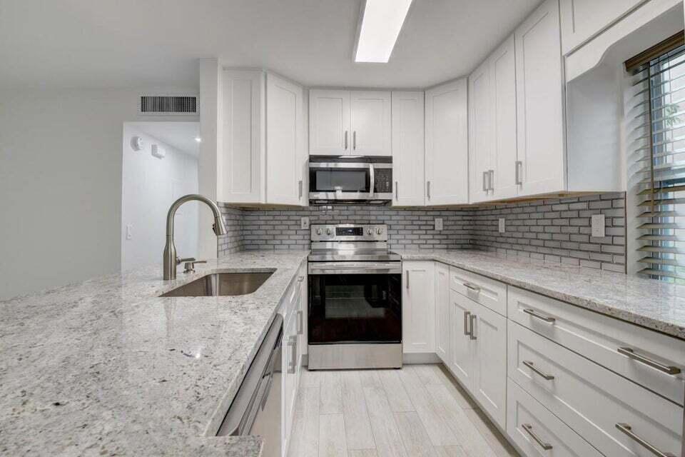 Photo of 93 Normandy B, Delray Beach, FL 33484 (MLS # R10984941)