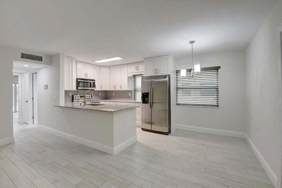 Photo of 93 Normandy B, Delray Beach, FL 33484 (MLS # R10984941)