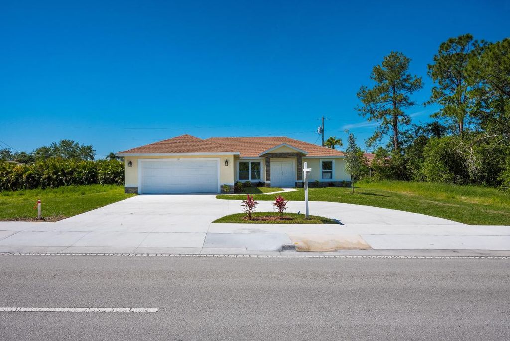 Photo of 122 SW Becker Road, Port Saint Lucie, FL 34953 (MLS # R11156443)