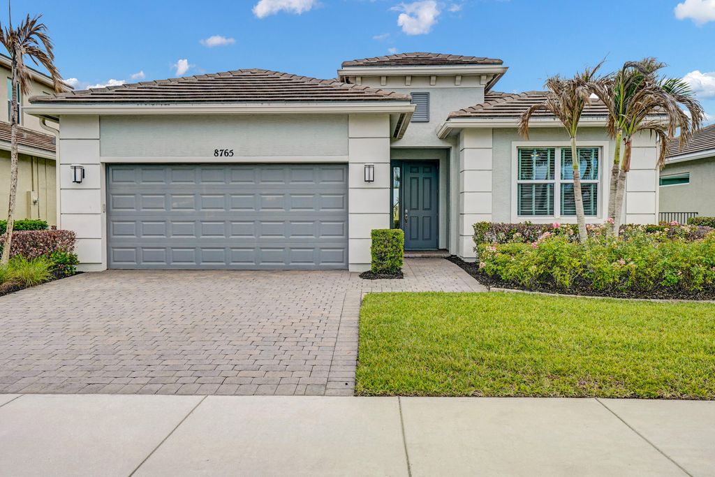 Photo of 8765 SW Vico Way, Port Saint Lucie, FL 34987 (MLS # B26031222)