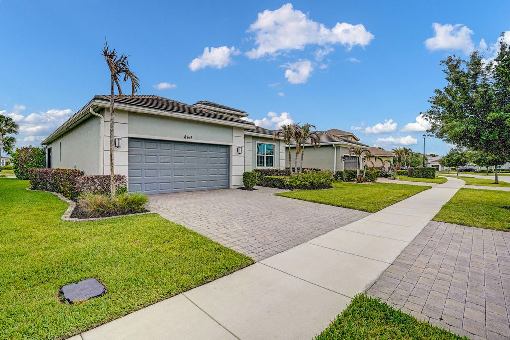 Photo of 8765 SW Vico Way, Port Saint Lucie, FL 34987 (MLS # B26031222)