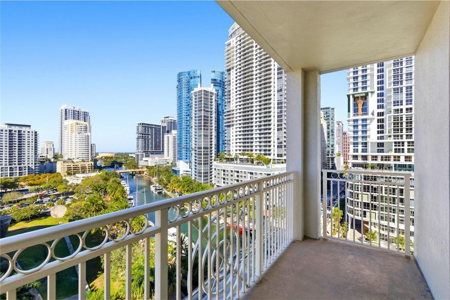 Rare River Facing 3/2 Corner Unit. Stunning River, City, Sunset Views! Completely remodeled kitchen w/ upgraded appliances, custom extended peninsula. Luxury vinyl plank floors. Laundry room w/ full size machines. Custom window shades & closet built-ins all bedrooms. Remote control living room curtains. Primary bedroom walk-in closet. Primary bath dual sinks. Move-in ready. Conveniently located parking space within integrated garage. Monthly HOA $1,414 incl water/sewer/trash, parking, amenities: 24 hour concierge, front desk, package room, rooftop pool/lounge, bbq grills, gym, basketball, racquetball, yoga studio, jacuzzi, steamrooms, saunas, massage room, bike/kayak racks, business center, yoga lawn. Pet & Investor friendly. Walk 5 min to Las Olas dining, shopping, entertainment!