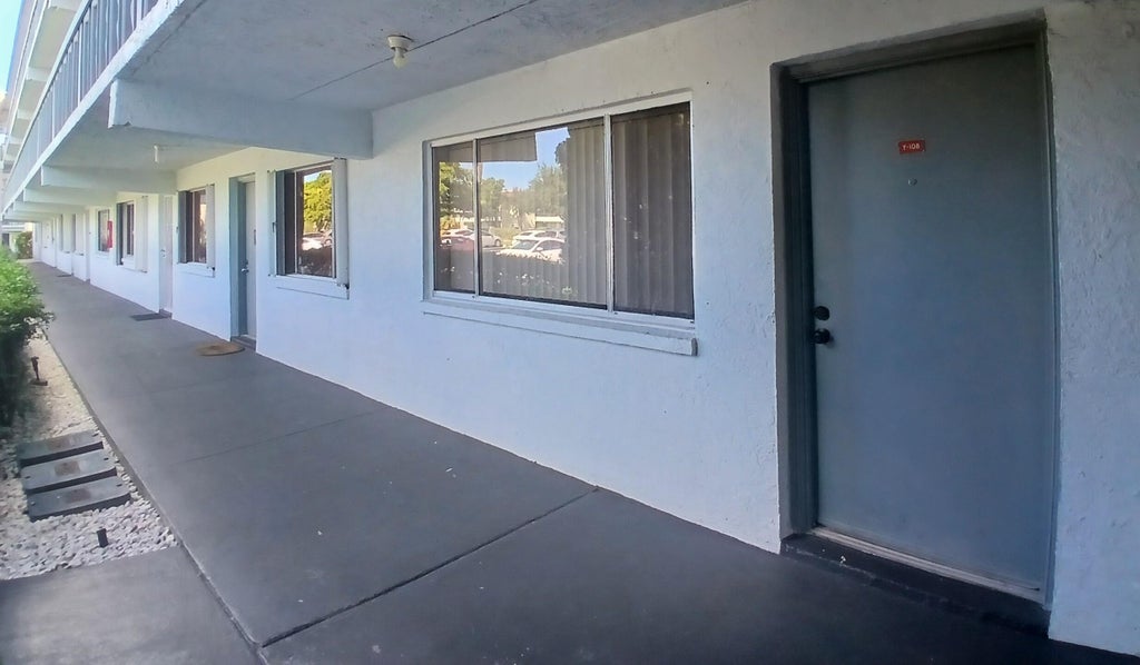 Photo of 2100 SPRINGDALE BLVD #108, Palm Springs, FL 33461 (MLS # B26090144)