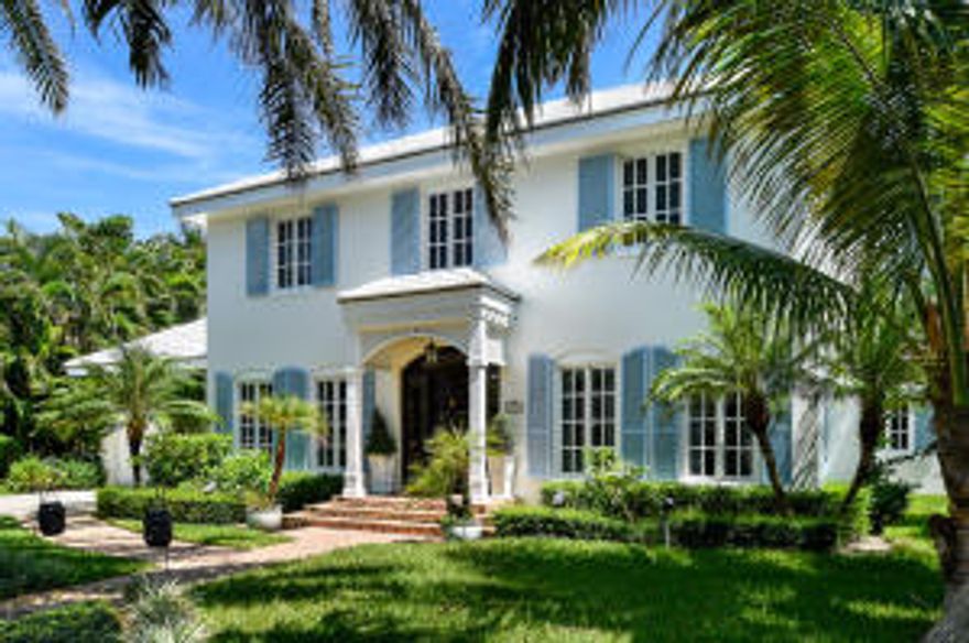 Gorgeous British Colonial with tropical courtyard, beautiful pool, and lanai. Two story 4BR/3.5BA with library, media room and fireplace. Viking gas appliances including double oven, marble and hardwood flooring, impact glass and two car garage. Amazing Master Suite with large closets and balcony overlooking pool. Excellent North End beach street.