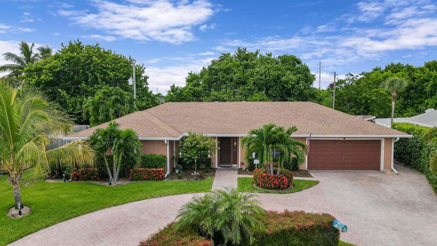 This fantastic pool home located in Tequesta Pines sits nicely on a quiet cul-de-sac in the highly desirable Village of Tequesta. Excellent condition inside and out with split floor plan of 3 bedrooms + office, 2 baths, custom closets, vaulted ceilings, and wood flooring throughout. This single-family home also features a lovely custom kitchen, stainless steel appliances, granite counters, crown molding, wine rack & wine cooler. The backyard feels like an oasis with the large, newly screened in patio overlooking private salt water pool & spa with a new pool heater and pump, Tiki Bar and new fence makes this home perfect for entertaining! Tequesta Pines is a highly desirable community and very close to the beautiful beaches, 'A' Rated Schools and great parks!

Just minutes to The famous Jupiter Lighthouse, shopping, dining and more!
