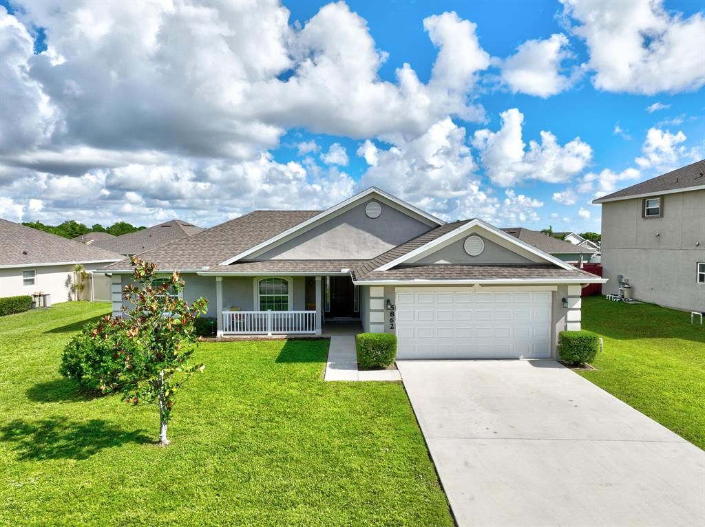Photo of 5862 NW Leah Drive Dr, Port Saint Lucie, FL 34986 (MLS # R10821821)