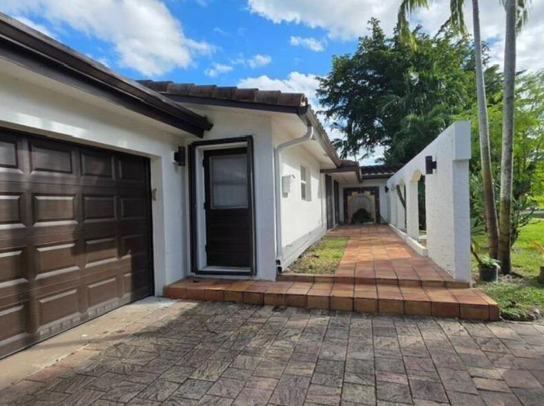 Photo of 690 NW 68TH Avenue, Plantation, FL 33317 (MLS # B26082260)