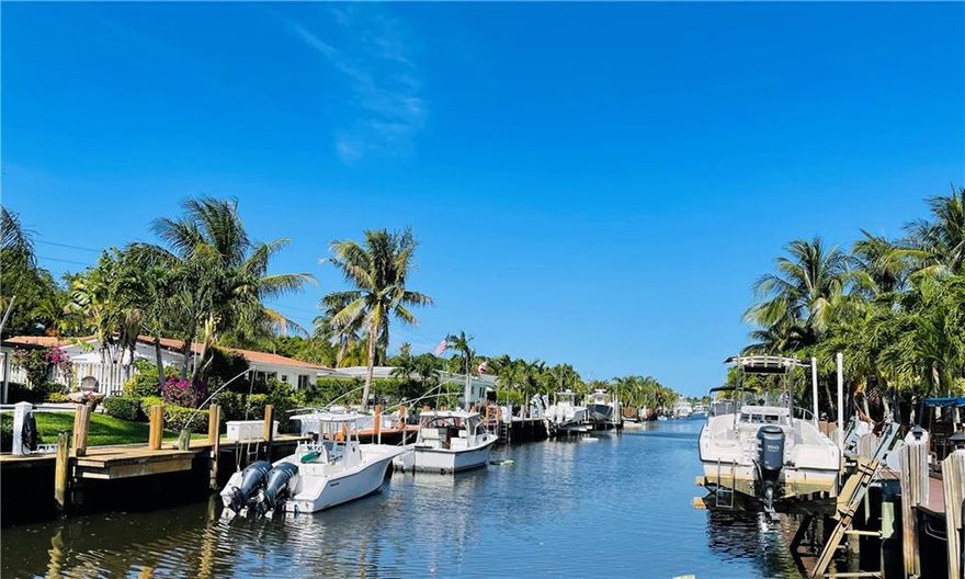 ((Motivated Seller is purchasing another property so they are very MOTIVATED & willing to buy down the buyers interest rate & will pay for all of Buyers standard closing costs)).. Amazing FULLY REMODELED OCEAN ACCESS home, No Fixed Bridges, located in a MULTI MILLION DOLLAR NEIGHBORHOOD. DOCK YOUR BOAT in your own backyard, PRIVATE DOCK. Large CORNER LOT with Over 1/4 Acrea, great space for a pool. Open Concept floor plan w/a FULLY RENOVATED KITCHEN, Huge Kitchen Island, HURRICANE IMPACT WINDOWS & DOORS, new floors, newer AC, SPLIT FLOOR PLAN, 2 bathrooms have their own EN-SUITE BATHROOMS.Furniture negotiable. Close to awesome restaurants, shopping, just 10 minute drive to Deerfield Beach & Mizner Park(depending on traffic), close to major Hwys. All measurements &  sq.ftg is approximate HUGE 5% COMMISSION$$$