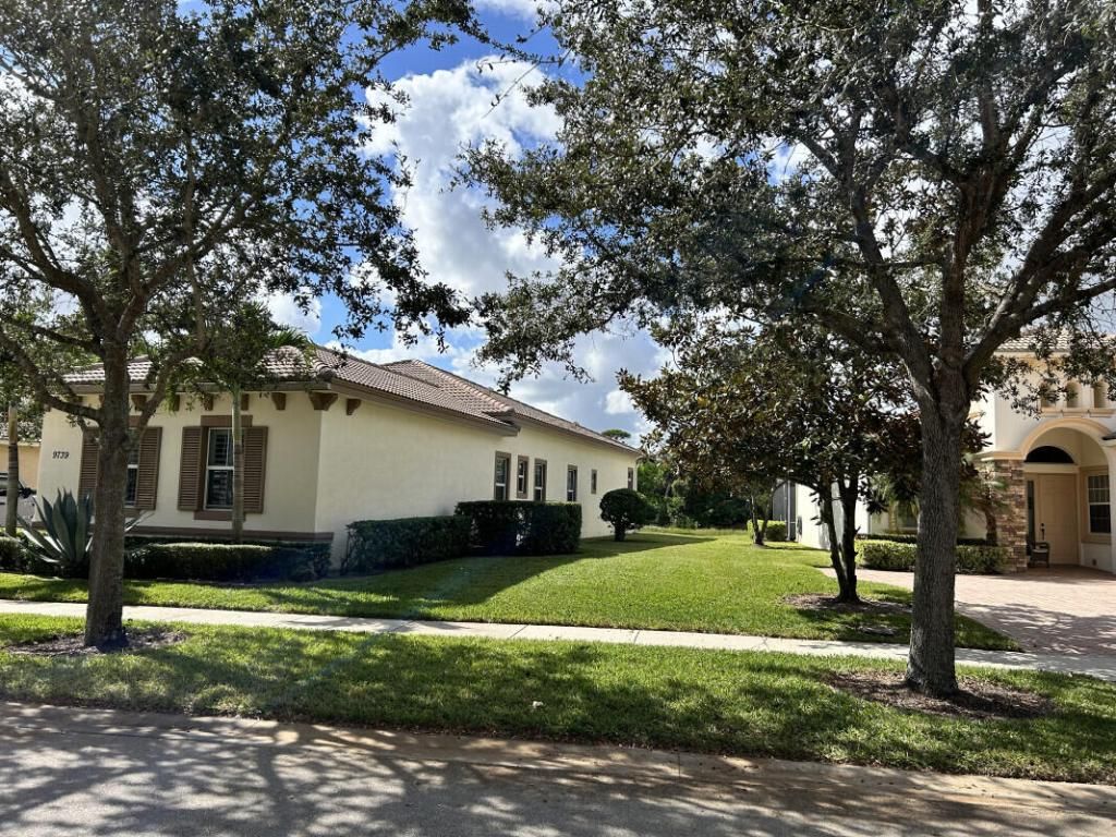 Photo of 9739 SW Nuova Way, Port Saint Lucie, FL 34986 (MLS # R10934424)