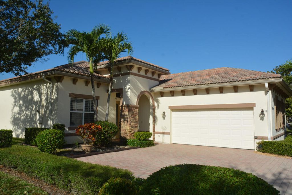 Photo of 9739 SW Nuova Way, Port Saint Lucie, FL 34986 (MLS # R10934424)