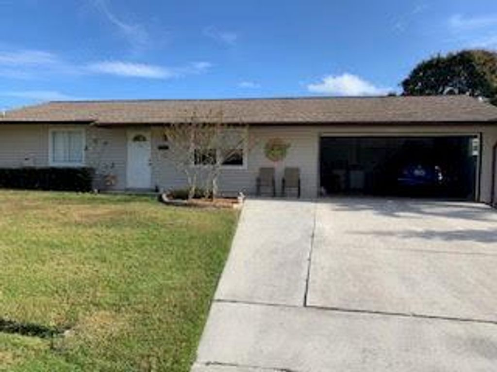 Photo of 614 SE Evergreen Terrace, Port Saint Lucie, FL 34983 (MLS # R10700763)
