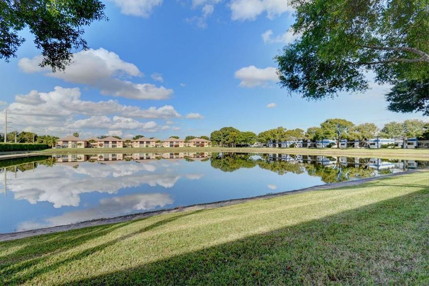 Spectacular lakeside living is your in this spacious Lakes of Delray condominium. Beautiful foyer leads into an open-concept living space with upgraded fixtures and finishes. Spacious kitchen with updated appliances and incredible storage for all of your culinary adventures. Charming lakefront lanai offers a cozy spot for entertaining or a quiet reading nook. Spacious owner's suite includes a lovely seated vanity. Generous laundry room designed for maximum convenience with built-in wardrobe station. You'll love life in gated Lakes of Delray. This active adult condominium community offers all of the amenities and social activities you're looking for in a spectacular setting. Magnificent clubhouse, multiple pools, bathhouses, and spas plus tennis and pickle ball courts. This one's a must-see