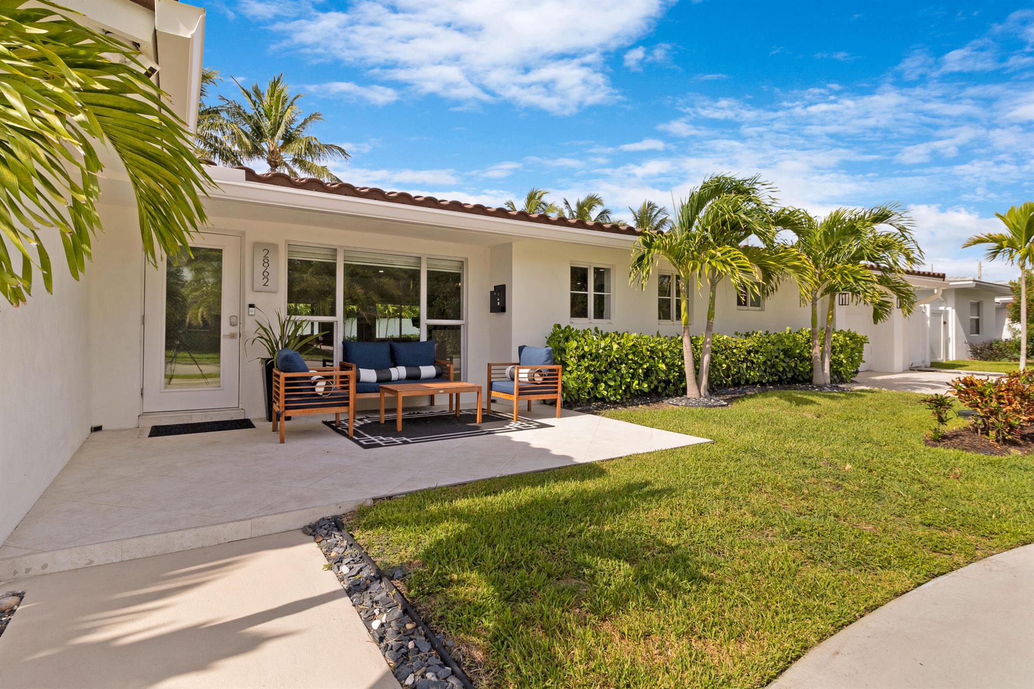 Live the Lighthouse Point lifestyle just steps from Cap's Place and Frank McDonough Park! This fully SOLAR-powered (owned solar) 4 bed, 4 FULL bath home blends cutting-edge technology with elevated coastal comfort, boasting over 2,600 sqft of living space, ideal for entertaining. The chef's kitchen stuns with a leathered honed quartz island, Viking 8-burner GAS RANGE (120-gallon tank), oversized 66'' built-in refrigerator and freezer, MIELE BUILT-in COFFEE system, and wine fridge. Bright, open-concept living areas feature white oak engineered hardwood flooring and a sleek ventless bioethanol fireplace. Dual A/Cs (2024 & 2011), two tankless water heaters (2021), IMPACT WINDOWS, updated electrical panels and PVC PLUMBING to ensure peace of mind. Love the furniture too? Furniture can be