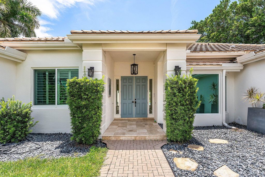 Photo of 2297 NW 55th Street, Boca Raton, FL 33496 (MLS # R11098699)