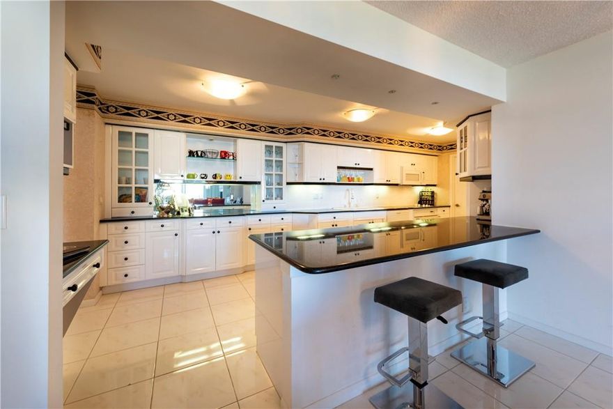 Spectacular Waterfront Luxury  Americas on the Park Never miss a sunrise or sunset with this gorgeous unit overlooking the  intercostal waterways.This gorgeous furnished 11th floor condo is in a gated community with a 24 hour guard.Completing this gorgeous condo is a living room / dining room open concept. The master bedroom has a king size bed with an en-suite and walk in closet. The guest room features a queen size bed with closet and a bath. Washer & Dryer in unit.The condominium offers many amenities such as a pool, BBQ, fitness room,  basic cable and water., one car covered garage parking, storage unit. Available dock to park your boat up to 35ft.Nearby the beach,  Las Olas, 10 min to Fort Lauderdale Airport  This is truly a place you'll want to call home!