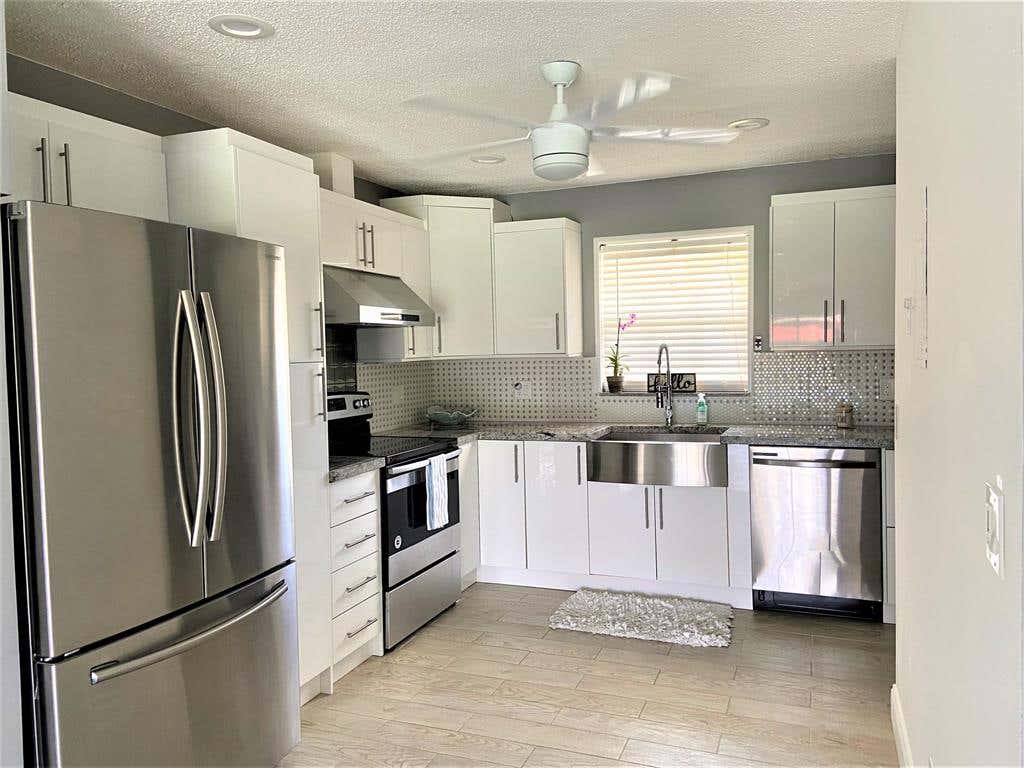 Photo of 665 Laconia Circle Cir, Lake Worth Beach, FL 33467 (MLS # R10734417)