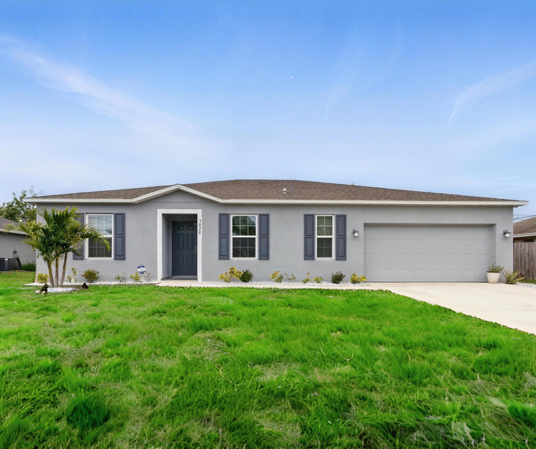 Wow! Like new and move in ready! Beautiful 4 bed, 2 bath, 2 car garage in Port Saint Lucie! This Maronda built Willow model was built in 2022 feature and open great room concept, granite kitchen and stainless appliances. Extremely clean and well maintained. Split floor plan allows for some privacy in three areas, plus additional flex space at entrance of home. Washer & dryer included. Great location convenient to area shopping, schools and I95,